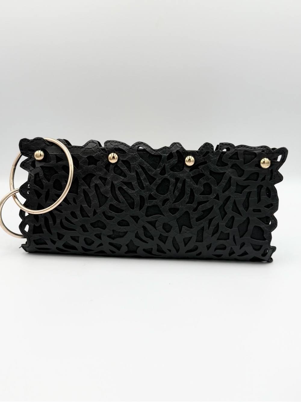 Black Laser-Cut Clutch with Gold Ring Accent